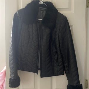 Stylish leather jacket with faux fur collar and cuffs